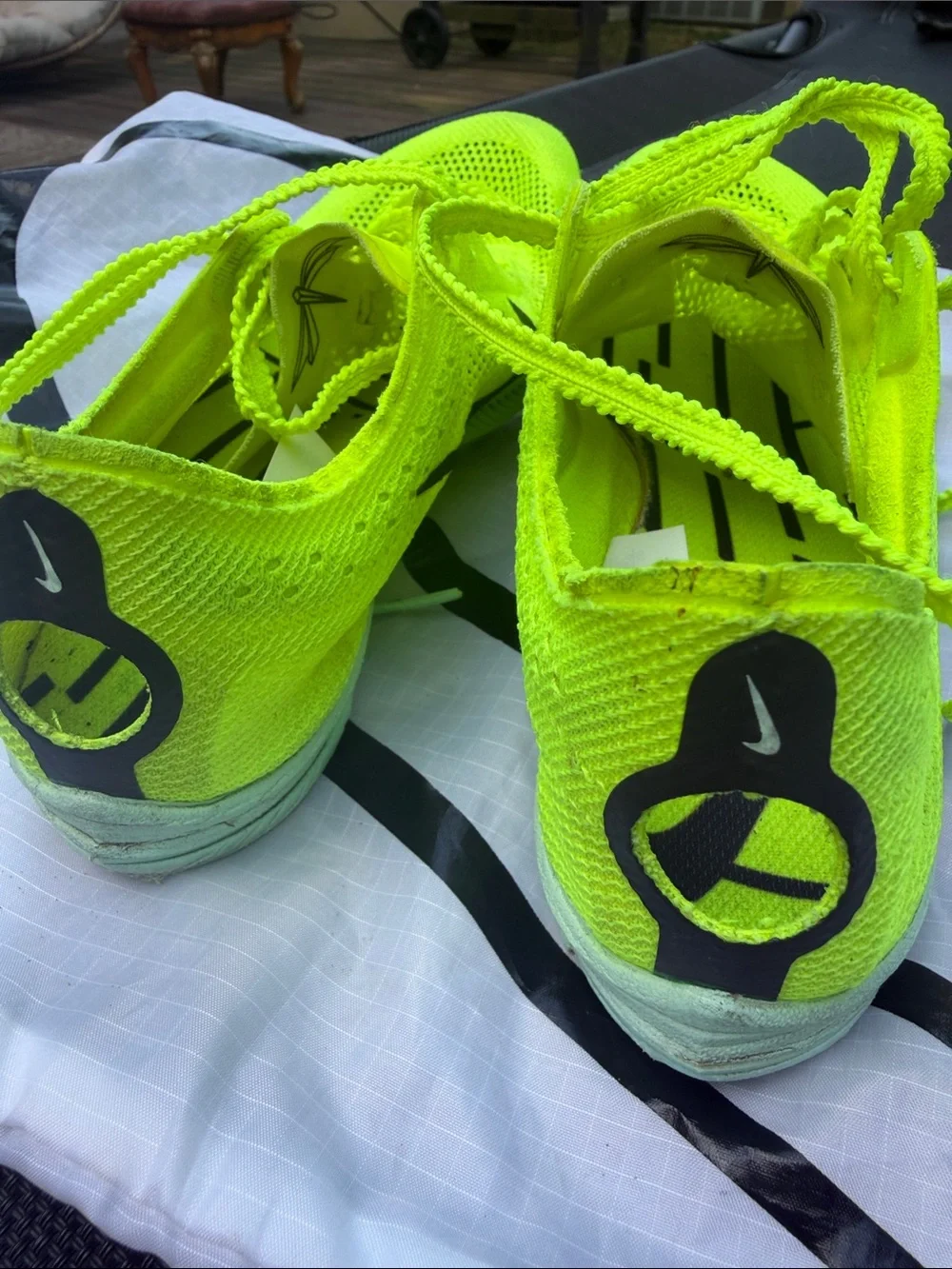Nike Bright spikes, come with shoes bag